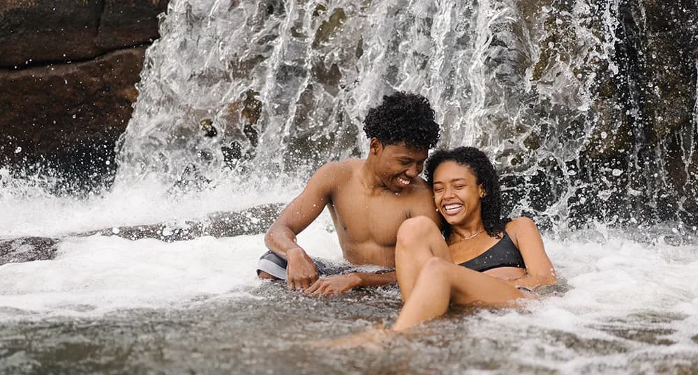 couple in waterfall