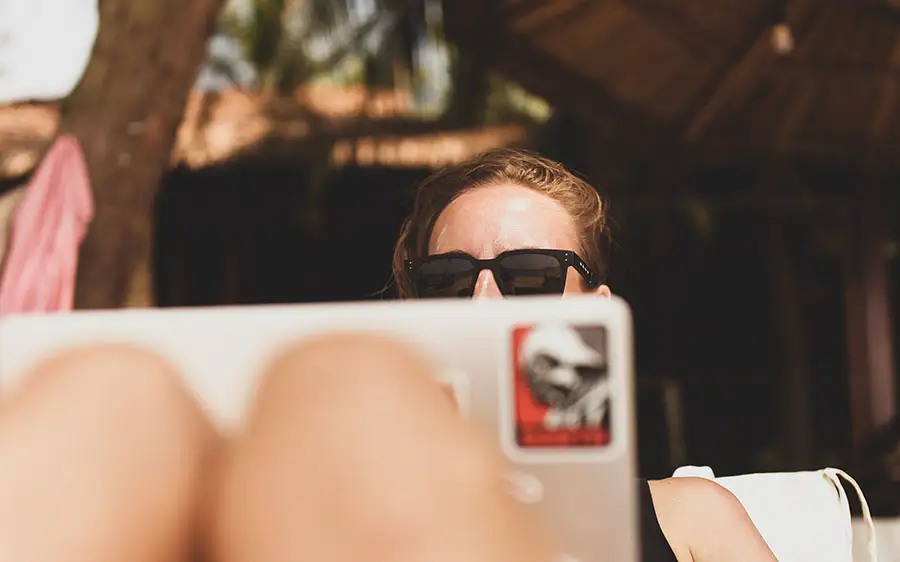 woman-working-remotely-using-laptop