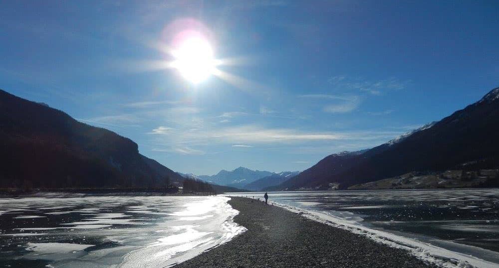 A semi-frozen lake in Resnia, Italy